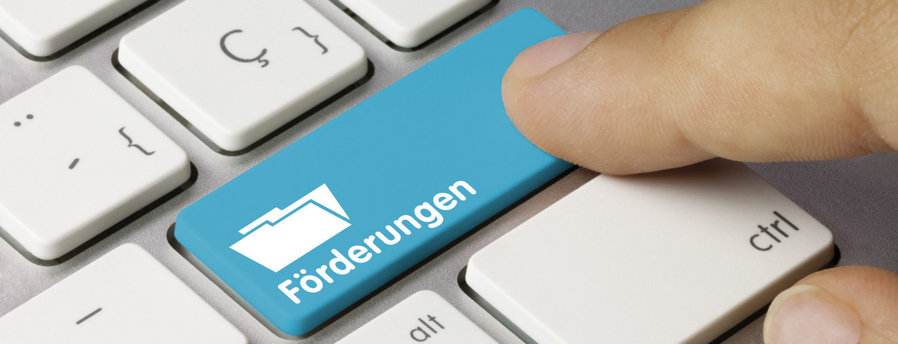 Schriftzug Förderung auf Enter-Taste einer Tastatur